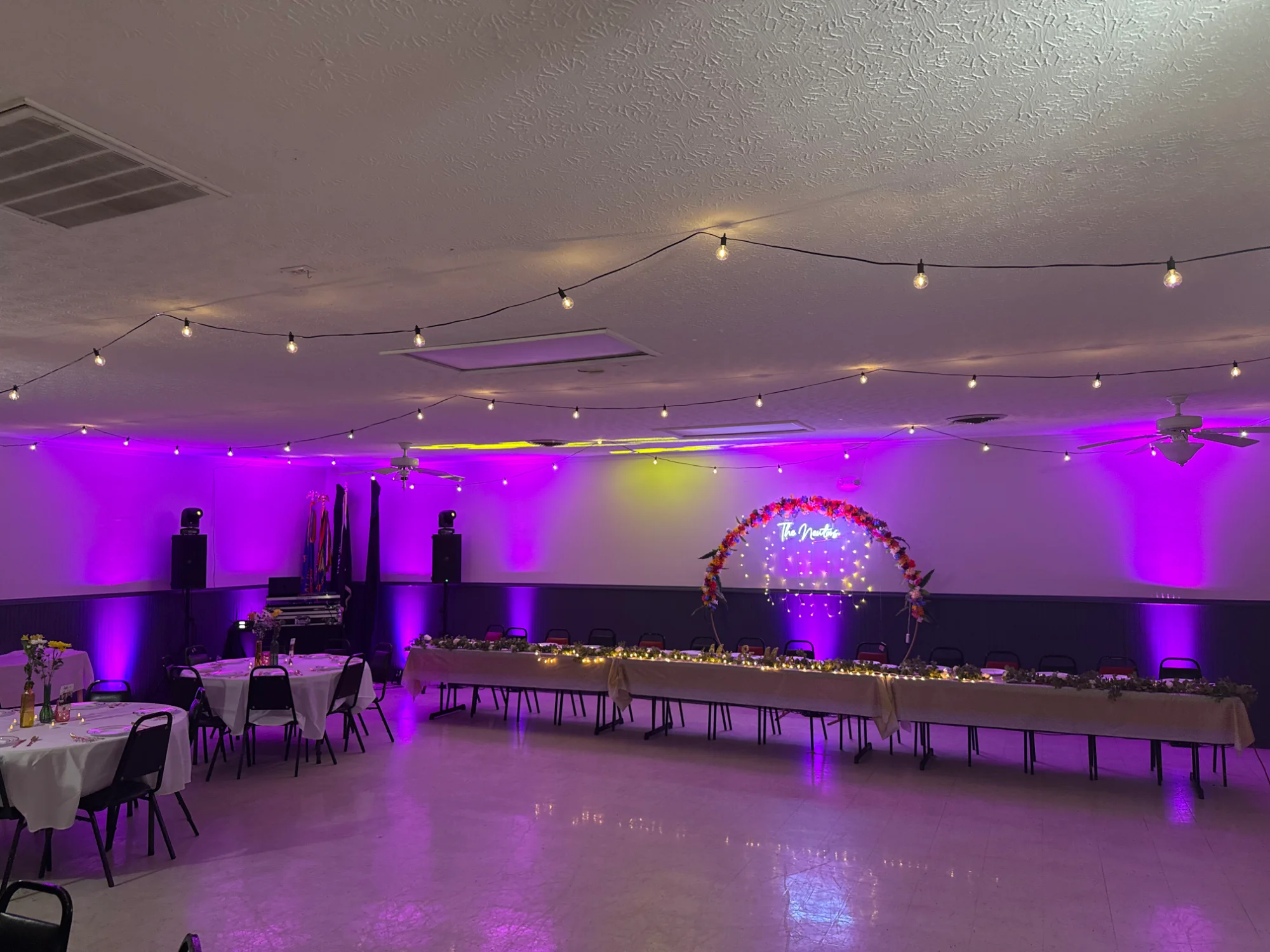 Wedding reception purple uplighting